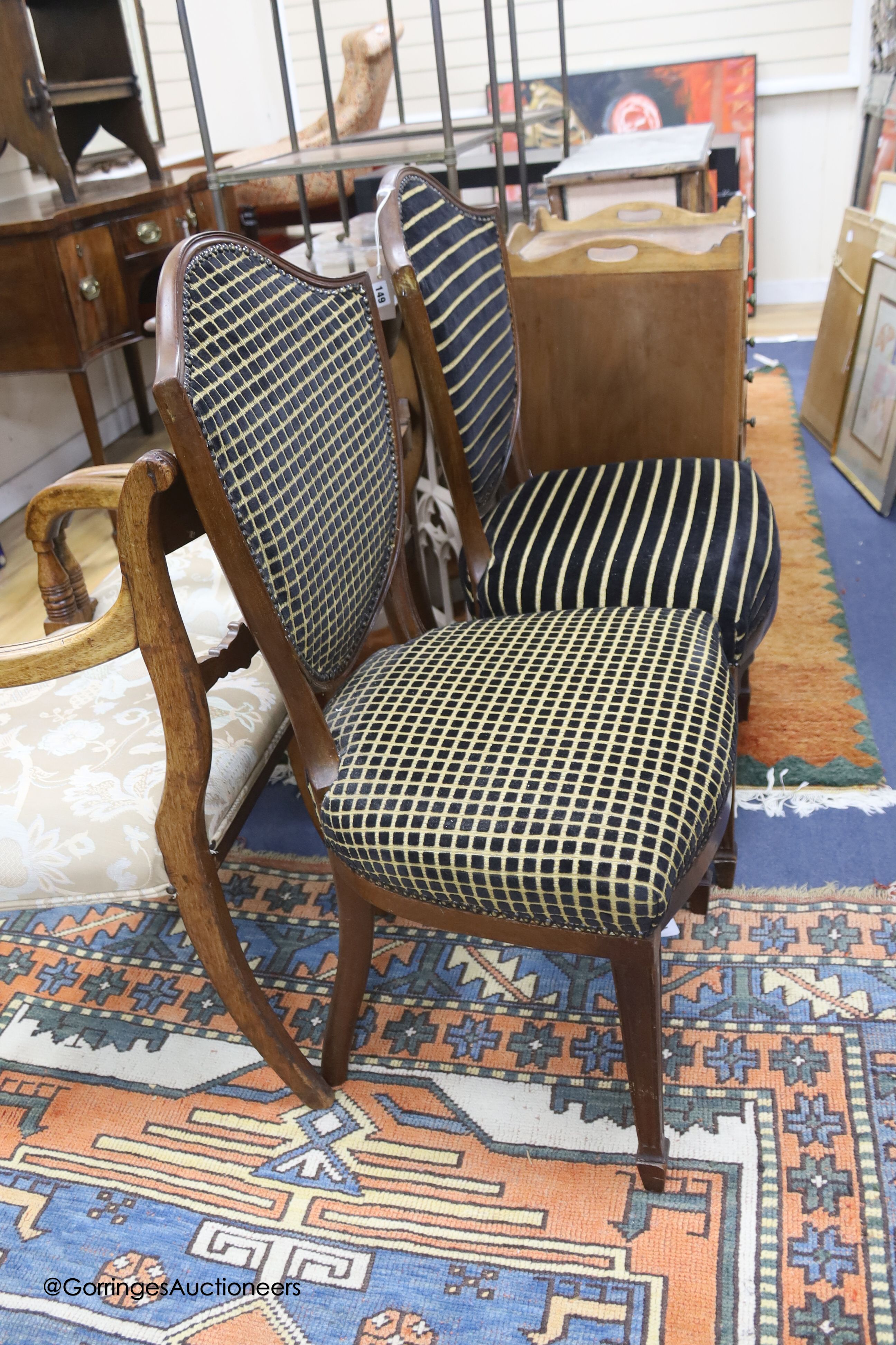 A pair of Edwardian hepplewhite style upholstered dining or side chairs